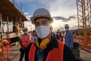 a construction worker with a mask