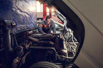 a truck being serviced a truck being serviced