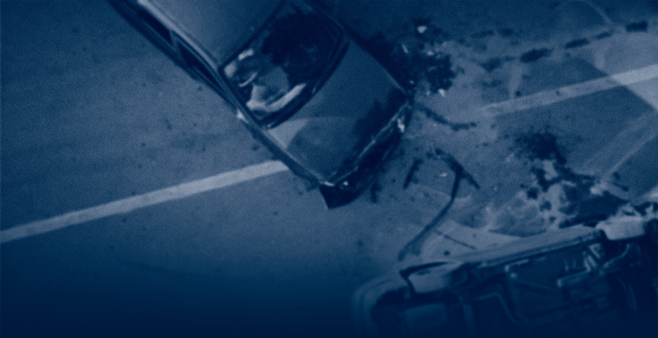 overhead car accident crash with blue filter